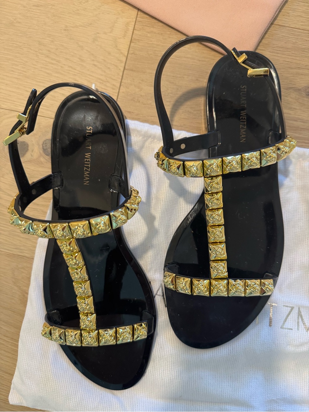 Stuart Weitzman Black Patent T-Strap Sandals with Gold Studs